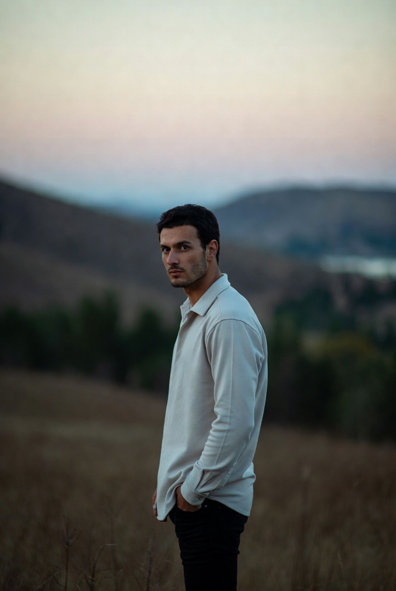 Portrait of founder Theo reviewing fabric organizers